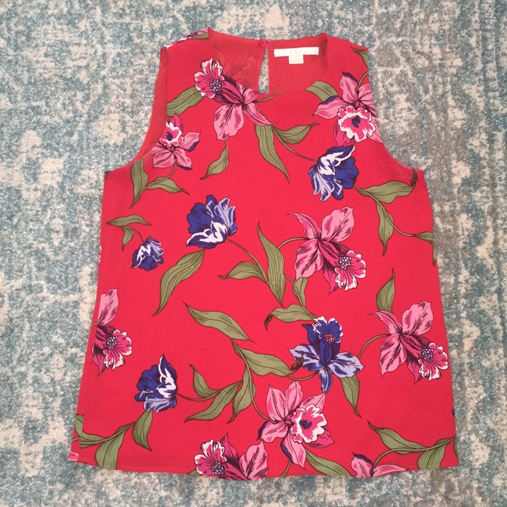 Red blouse with pink and blue flowers
